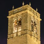 Photo of Carillon Bell Tower outside of the UW-Madison Social Science Building at night.